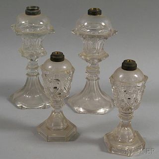 Two Pairs of Colorless Glass Oil Lamps
