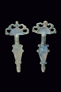 GOTHIC PAIR OF BRONZE RADIATE BROOCHES