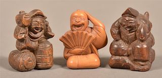 Three Carved Wood Chinese Figural Netsukes.