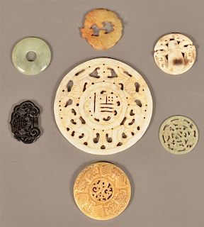 Seven Various Jade Discs and Medallions.