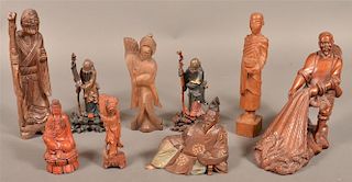 Nine Carved Wood Oriental Figures.