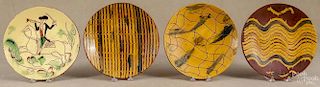 Lester Breininger, four redware plates, signed and dated 1984 and 1985, largest - 10 1/2'' dia.