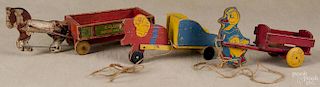 Three wood pull toys, 20th c., to include a Fisher Price Galloping Horse and Wagon, 16 1/2'' l.