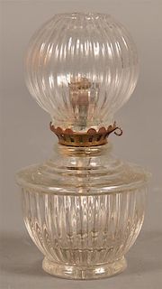 Early Colorless Glass Ribbed Fluid Lamp.