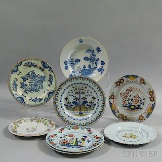 Eight Mostly Polychrome Delft Plates