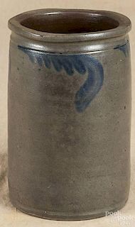 Cobalt decorated stoneware jar, 19th c., with floral swag, 8'' h.