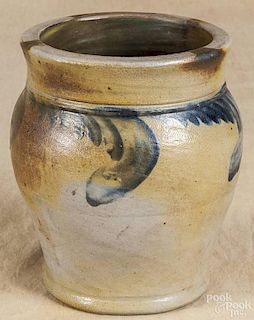 Cobalt decorated stoneware crock, 19th c., with floral swag, 8'' h.