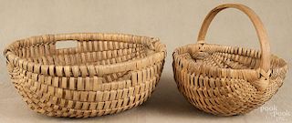 Two large splint gathering baskets, early 20th c., largest - 9 1/4'' h., 23 1/2'' dia.