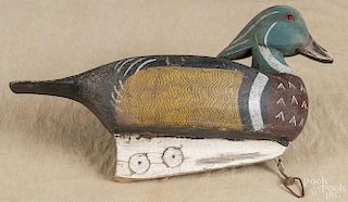 Carved and painted wood duck decoy, mid 20th c., 15'' l.