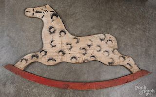 Carved and painted hobby horse end, early 20th c., 35'' l.