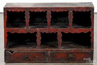 Painted pine hanging cupboard, 19th c., retaining an old red surface, 18 1/4'' h., 29'' w., 7'' d.
