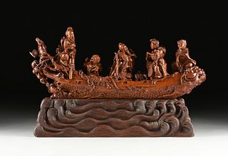 A CHINESE "EIGHT IMMORTALS CROSS THE SEA" CARVED BOXWOOD FIGURAL BOAT SCULPTURE, LATE 20TH CENTURY,