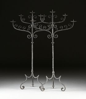 PAIR OF RENAISSANCE STYLE BLACK PAINTED WROUGHT IRON FIVE LIGHT TORCHÈRES, POSSIBLY ITALIAN, LATE 19TH/EARLY 20TH CENTURY,