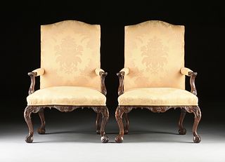 A PAIR OF GEORGE II STYLE UPHOLSTERED MAHOGANY LIBRARY ARMCHAIRS, 20TH CENTURY,