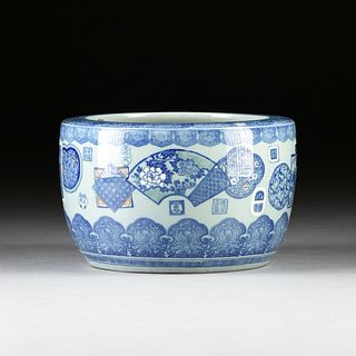 A JAPANESE CELADON AND BLUE AND WHITE GLAZED EARTHENWARE HIBACHI PLANTER, SEALS AND FANS, LATE MEIJI/TAISHO PERIOD (1868-1926),