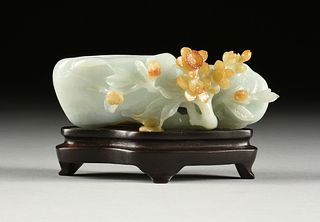 A CHINESE CELADON AND RUSSET JADE "PEACH AND BLOOMS" BRUSH WASHER, LATE QING DYNASTY, CIRCA 1900,