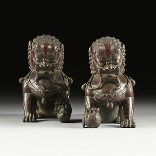 A PAIR OF MING DYNASTY STYLE LACQUERED BRONZE FU DOG GUARDIAN LIONS, QING DYNASTY (1644-1912),