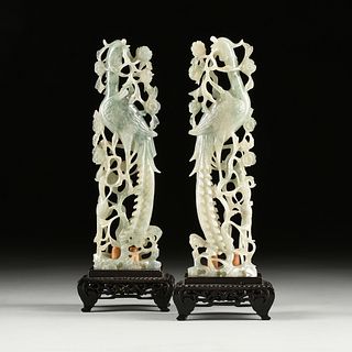 A PAIR OF CHINESE APPLE GREEN AND WHITE JADEITE PIERCED CARVINGS ON STANDS, PHOENIX AND ROSE, LATE QING DYNASTY, EARLY 20TH CENTURY, 