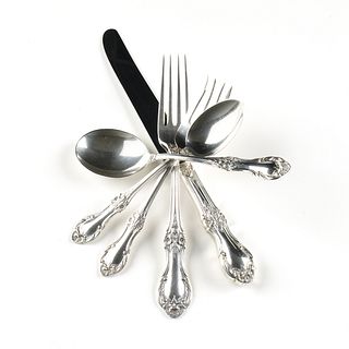 A 109 PIECE INTERNATIONAL SILVER CO. STERLING SILVER "WILD ROSE" LUNCHEON FLATWARE SERVICE, MARKED, 20TH CENTURY,