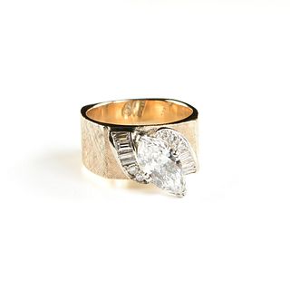 A 14K YELLOW AND WHITE GOLD MARQUISE CUT DIAMOND RING, 1970s,