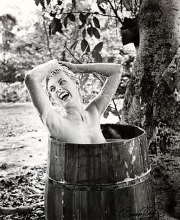 Bunny Yeager Photograph of Woman in Barrel