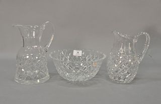 Three Waterford pieces including two pitchers and a center bowl. pitchers: ht. 8" & 9"; dia. 9"