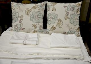 Four 100% Egyptian cotton coverlets along with two custom embroidered pillows, fitted sheets, etc.