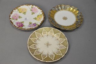 Three sets of luncheon plates to include a set of 12 Ovington Bros. Austria gold decorated, set of 10 Limoges flower painted and a s...