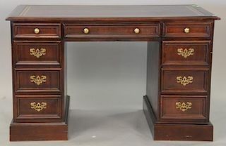 Hekman mahogany knee hole desk with leather top, ht. 30", wd. 48", dp. 25".