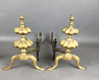 A Pair of Brass and Iron Andirons