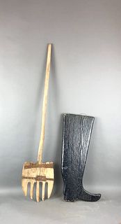 A Wooden Pitchfork and a Wooden Boot Wall Hanging
