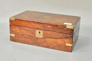 Small rosewood Victorian lap desk with brass bound corners and leather writing surface. ht. 5 1/2", lg. 14".