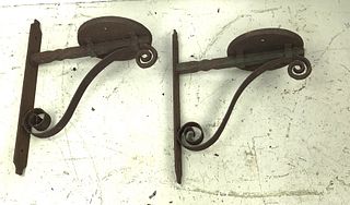 A Pair of Wrought Iron Wall Brackets