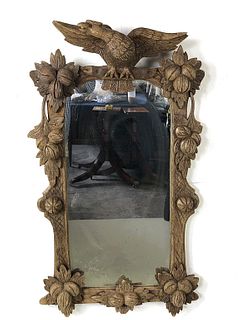 A Black Forest Style Oak Mirror