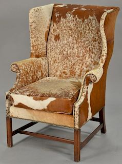 Hyde upholstered Chippendale style wing chair (some wear).