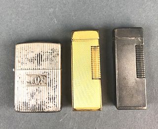A Sterling Zippo Lighter & 2 Dunhill Lighters