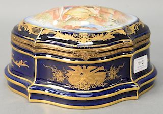 French porcelain lift top box having hand painted romantic scene on cover. ht. 5 1/2", lg. 10".