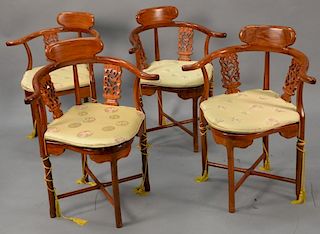 Set of four Chinese Oriental style armchairs.