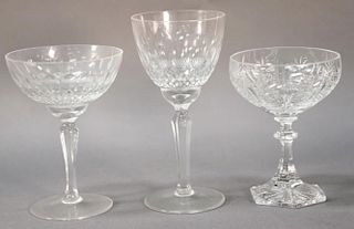 Two sets of crystal glass stems including two sizes of thumbprint glasses and eight glasses with hexagon base. thumbprint: (11) 5 3/...