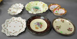 Six porcelain bowls and chargers to include hand painted double dish and a large bowl with moulded flowers (dia. 15").