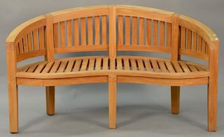 Teak curved bench. wd. 57 1/2"