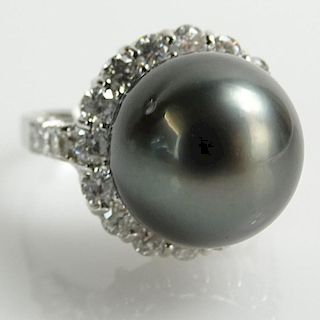 AIG Certified Tahitian Black Pearl, 1.21 Carat Round Brilliant Cut Diamond and 14 Karat White Gold Ring.