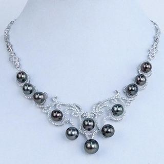 AIG Certified Tahitian Black Pearl, 5.51 Carat Round Brilliant Cut Diamond and 14 Karat White Gold Necklace.