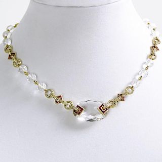 Art Deco Design 18 Karat Yellow Gold Necklace with Carved Rock Crystal Beads Accented throughout with 2.50 Carat Invisible Set Rubies and 4.0 Carat Ro