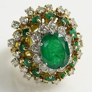 Lady's Vintage Approx. 4.35 Carat Emerald, 2.15 Carat Round Brilliant Cut Diamond and 18 Karat Yellow Gold Ring Set in the center with a 3.50 Carat Ov