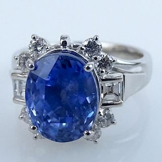 Extremely Rare GIA and AIG Certified 6.04 Carat Oval Cut Natural Unheated Sapphire, .66 Carat Square and Round Brilliant Cut Diamond and Platinum Ring