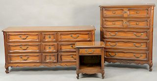 Three piece lot to include Louis XV style tall chest, triple chest, and night table. triple chest: ht. 32", wd. 67"; tall chest: ht....