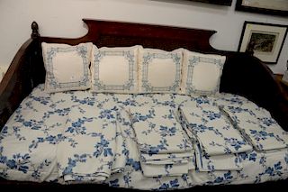Five custom embroidered coverlets with blue floral design ( 7' 4" x 7' 4") & four custom embroidered pillows.