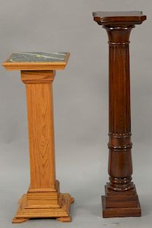 Two Contemporary pedestals, one oak with marble top and the other mahogany column style. ht. 36", top: 13" x 13" and ht. 45", top: 9...