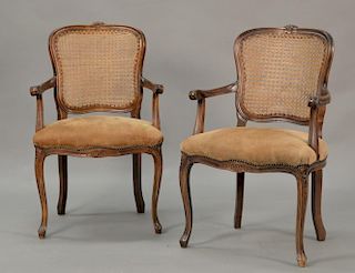 Pair of Louis XV style cane back armchairs.